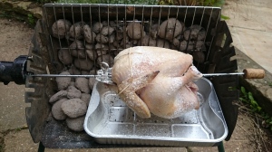 Chicken on a spit. It works better if you put the coals underneath really, but I was experimenting.